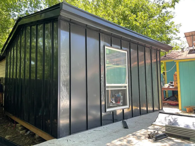 Black standing seam metal wall panels for Roof Inspection in Tuckahoe